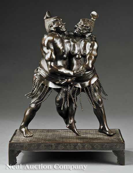 A Japanese Bronze Figural Group of Two Sumo Wrestlers probably