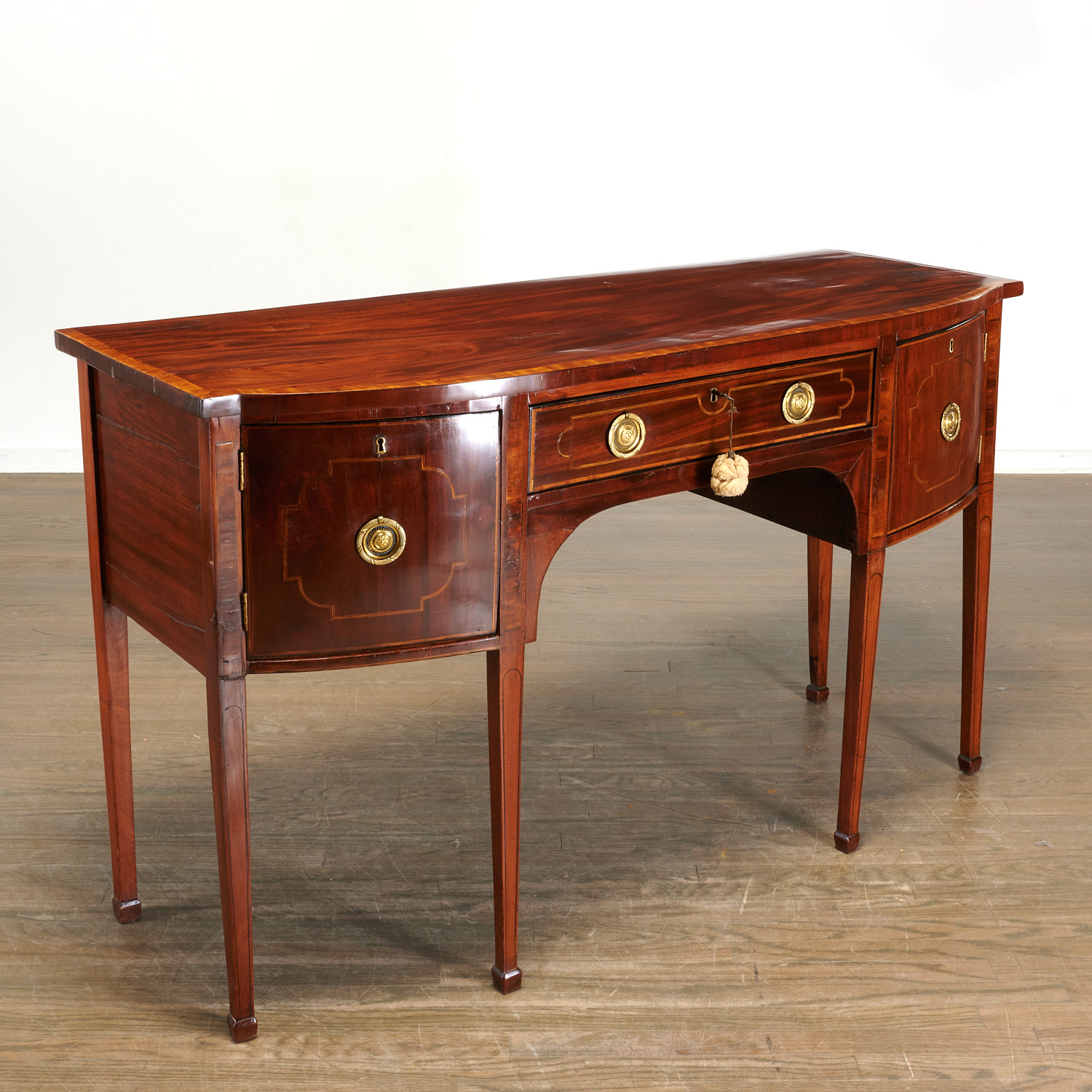 GEORGE III BRASS MOUNTED MAHOGANY SIDEBOARD 19th c curved front