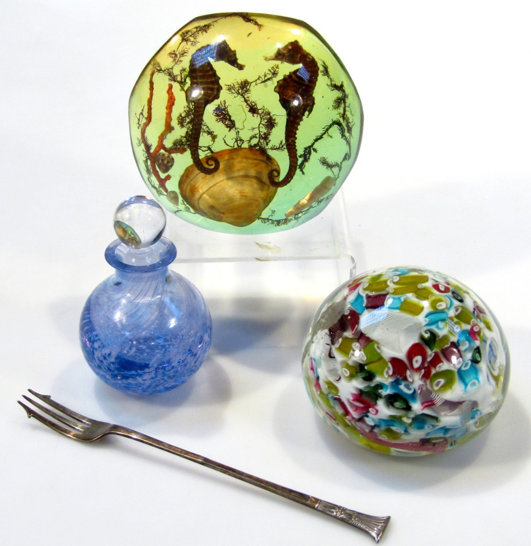 A modern Dunhill style paperweight set with sea horses and