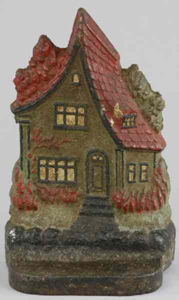 RARE COTTAGE DOORSTOP Depicts a quaint rustic cottage with stylized
