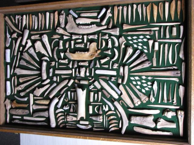 Frame with bone tools ceramic and shell beads 24 x