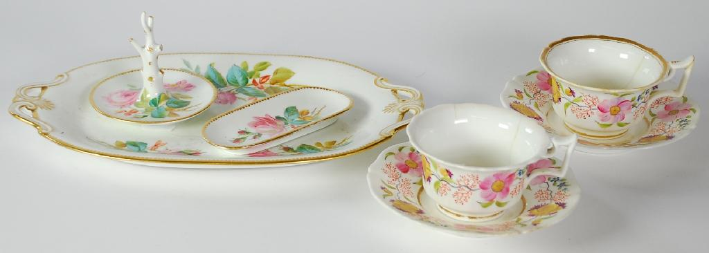 PAIR OF 19th CENTURY HAND PAINTED ROCKINGHAM PORCELAIN TEA CUPS