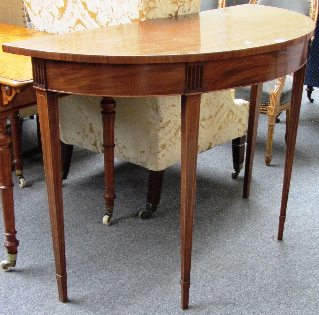 A George III design inlaid mahogany semi elliptic console table