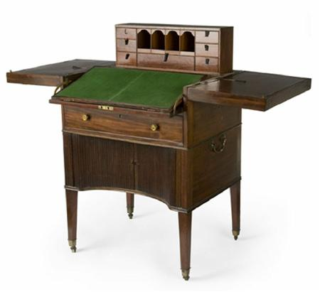 An unusual George III mahogany combined gentleman s writing and