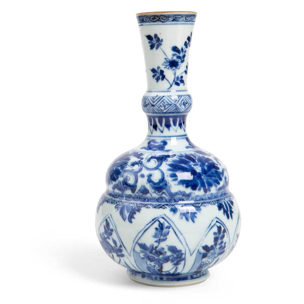 BLUE AND WHITE MOULDED BOTTLE VASE KANGXI PERIOD the slightly