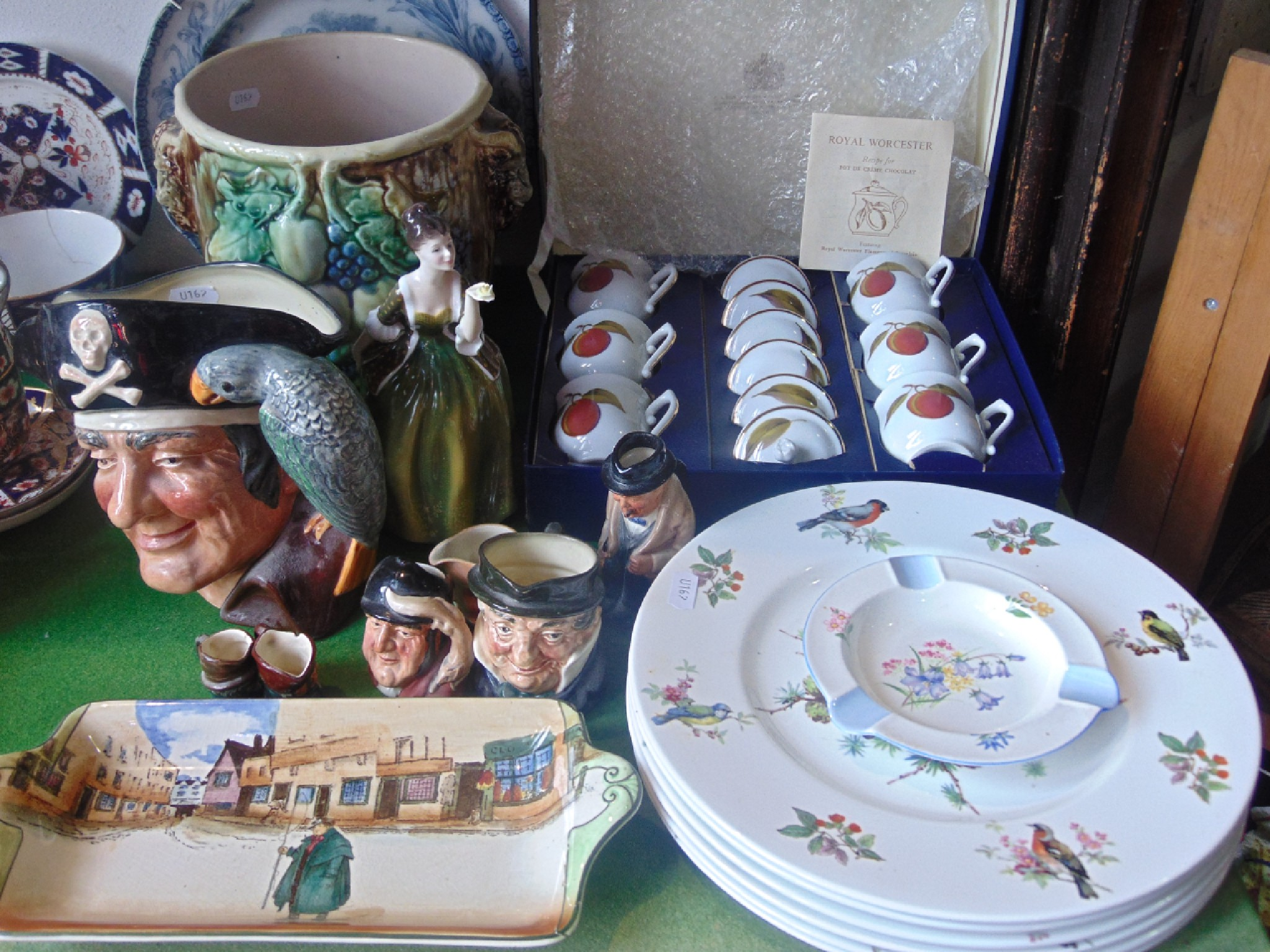 A collection of Royal Doulton wares comprising a figure of