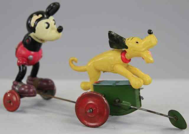 MICKEY PULLED BY PLUTO Japan celluloid figure of Mickey in
