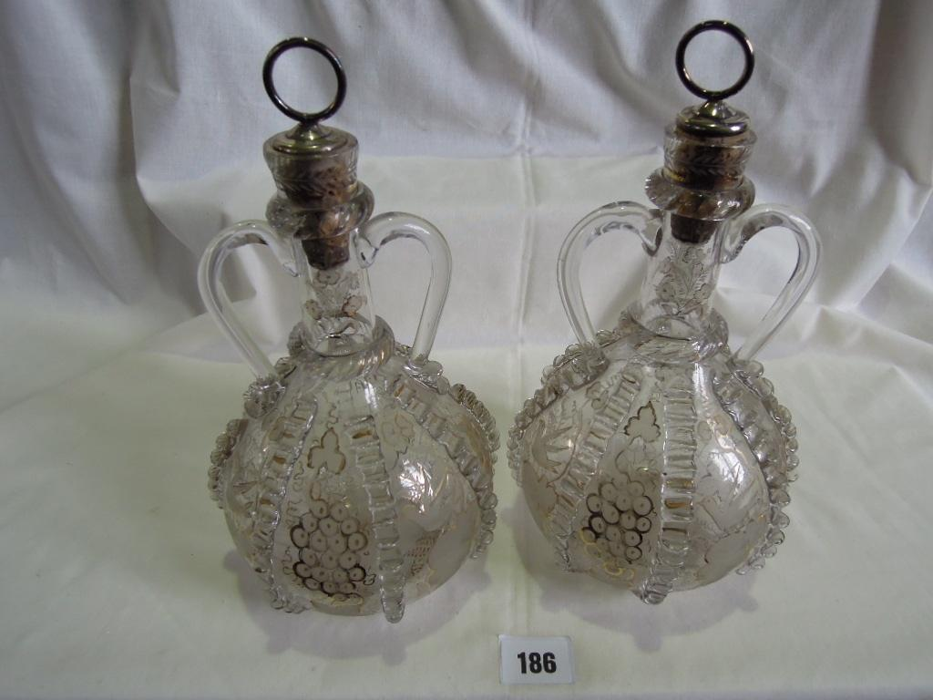 A pair of 19th century continental two handled bottles and