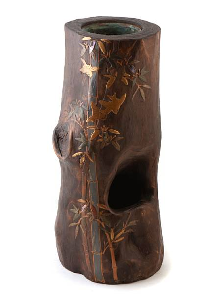 A Japanese tree trunk flower arranging vase with gilt lacquer