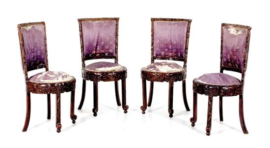 Four Chinese carved hardwood side chairs 19th century curved padded