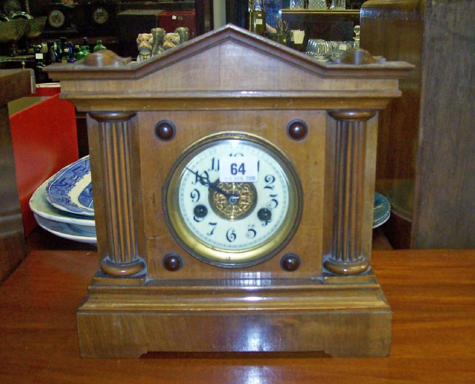 A Victorian walnut cased mantel clock 10 20