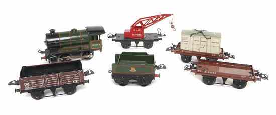 A Pressed Metal Train Set comprising an engine and five