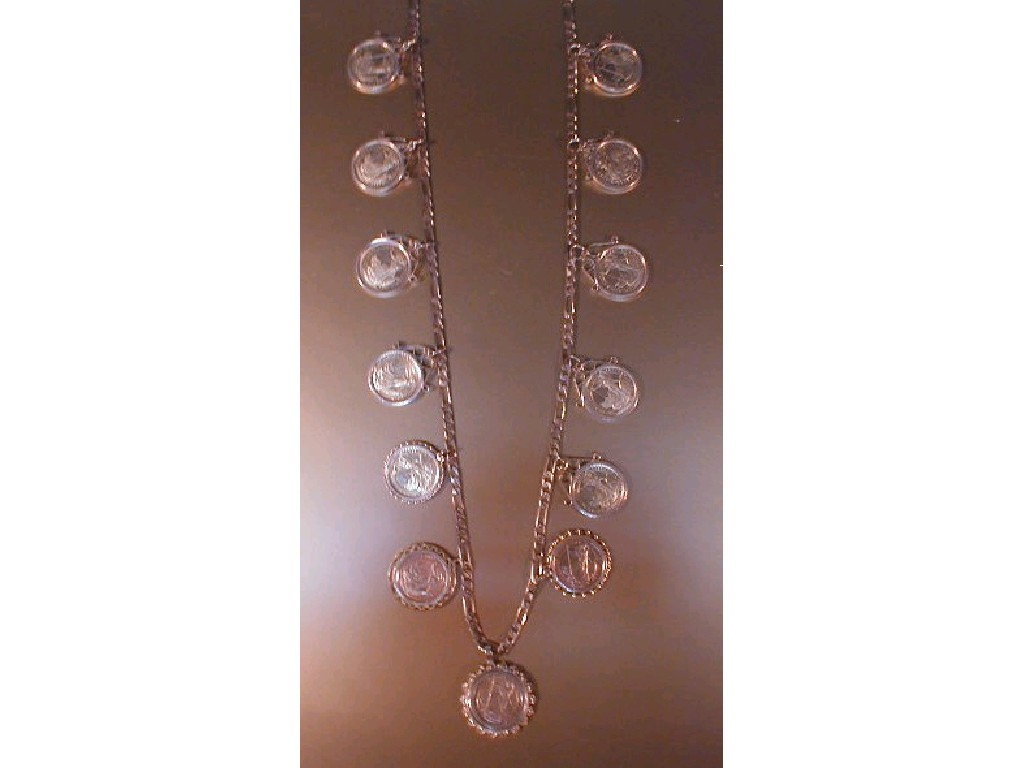 A flat curb link necklace with thirteen Brittania 1 10th