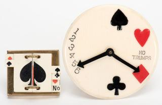 Two Trump Indicators Including a round celluloid example with two