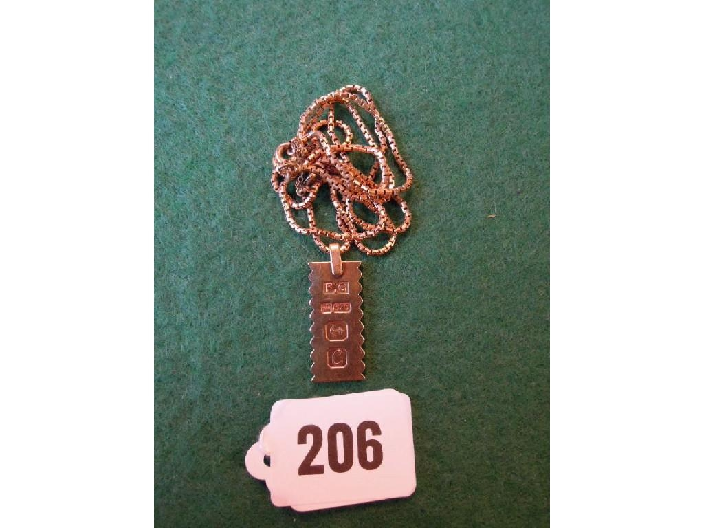 A 9ct gold ingot 8gm with fine link chain