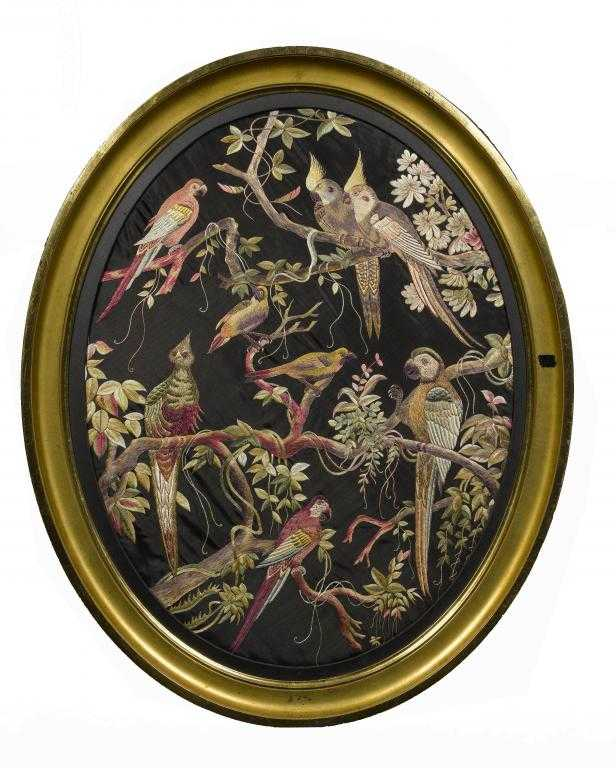 A CHINESE EMBROIDERED SILK PANEL worked in brightly coloured and