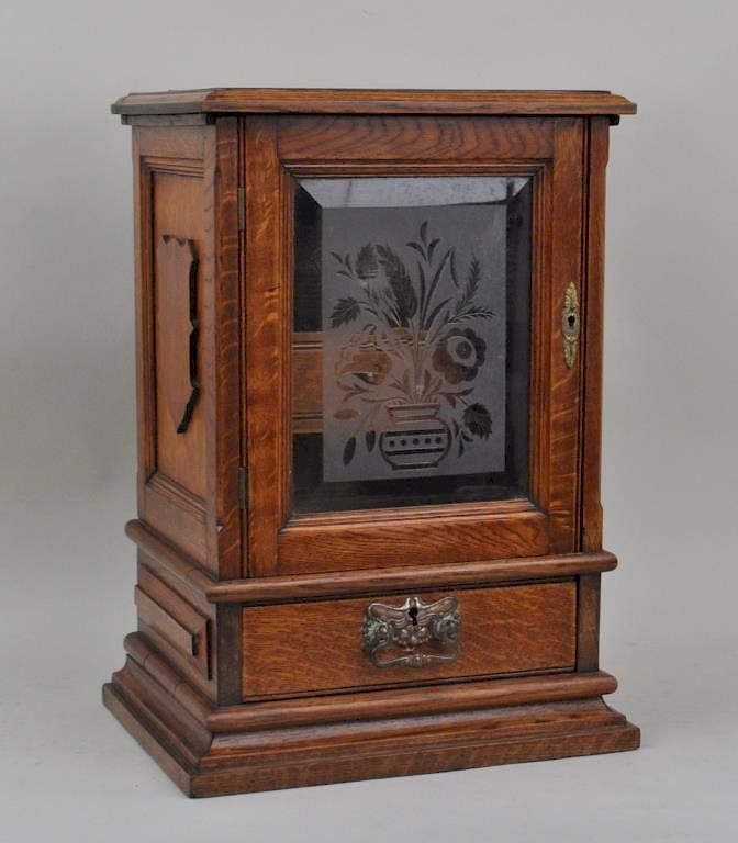 English Victorian Oak Tobacco Cabinet with florally engraved glass door