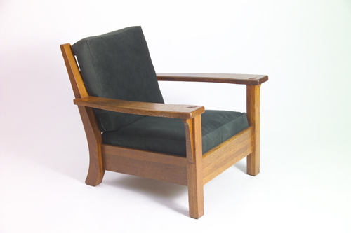 LIMBERT Oversized armchair with fixed shaped back broad open arms