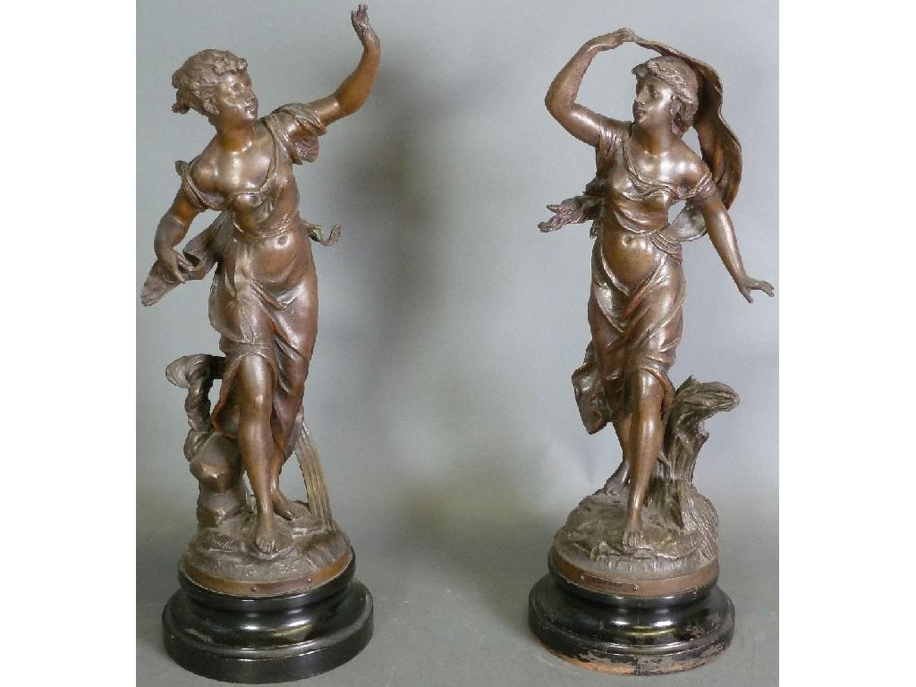PAIR OF EARLY TWENTIETH CENTURY FRENCH PATINATED SPELTER FIGURES OF