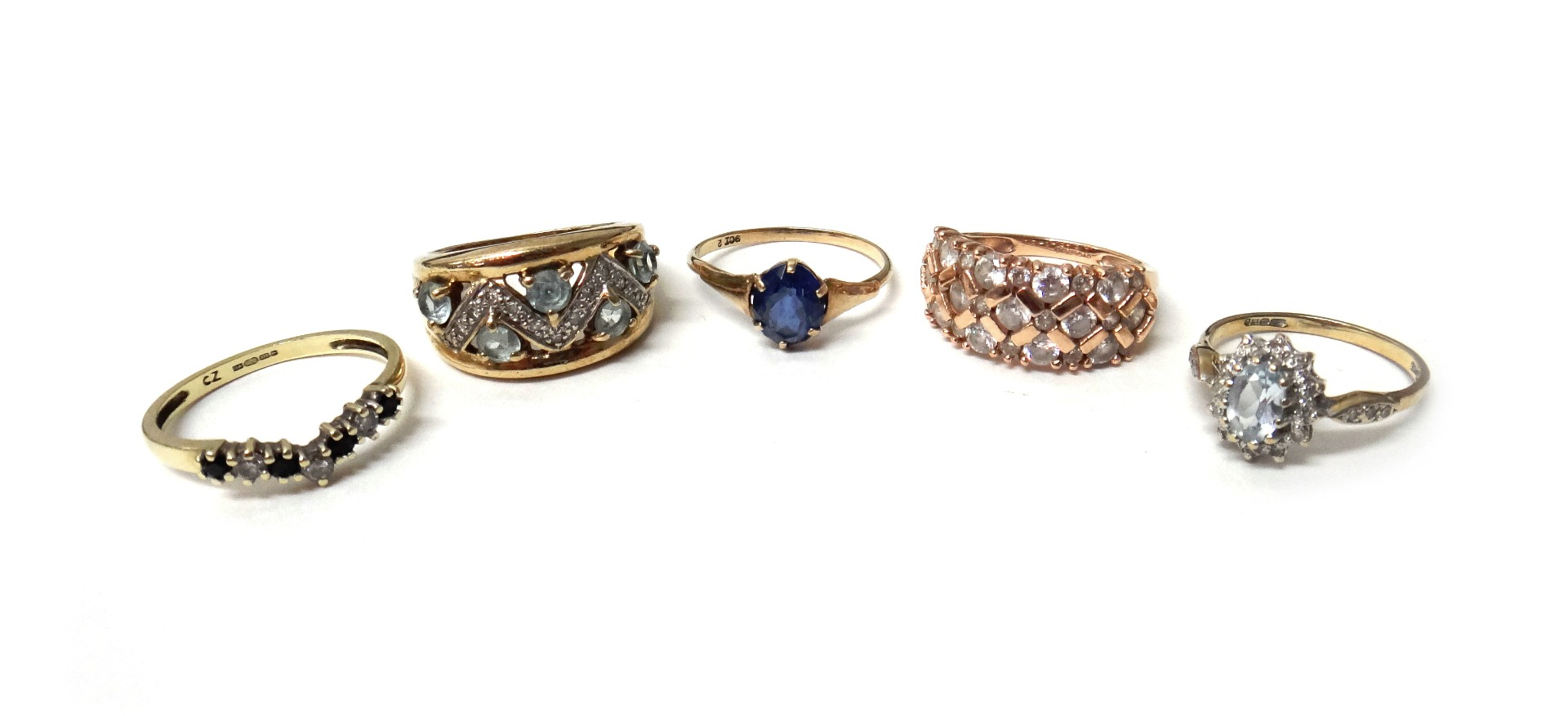 A 14ct gold and colourless gem set panel shaped ring