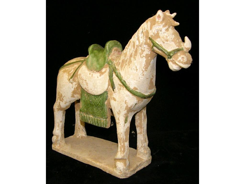 Ming period terracotta pony with green glazed saddle and saddle