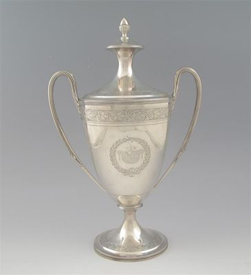 A George III vase shaped cup and cover on a