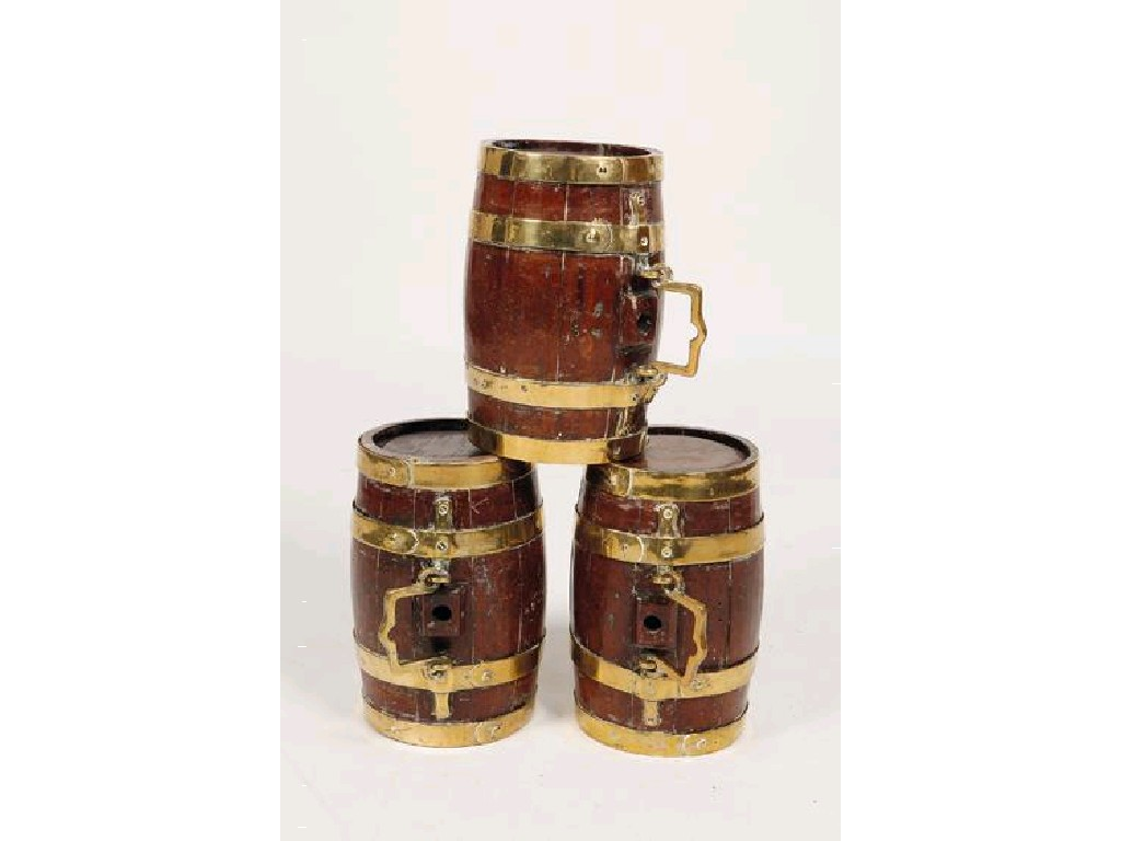 A SET OF THREE BRASS BOUND SPIRIT BARRELS of coopered