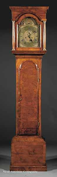 A George II Carved Walnut Tall Case Clock c 1750