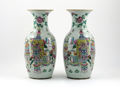 A pair of Chinese famille rose vases painted with screens