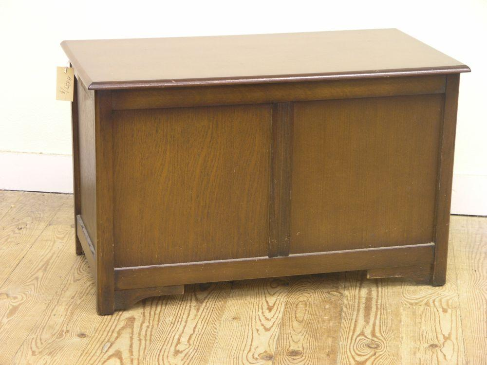A reproduction oak veneered blanket chest 2ft 6in