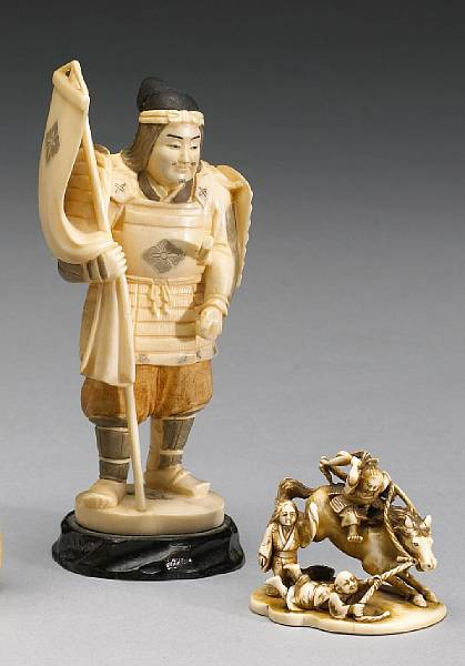 Two ivory figural carvings The first a small humorous Meiji