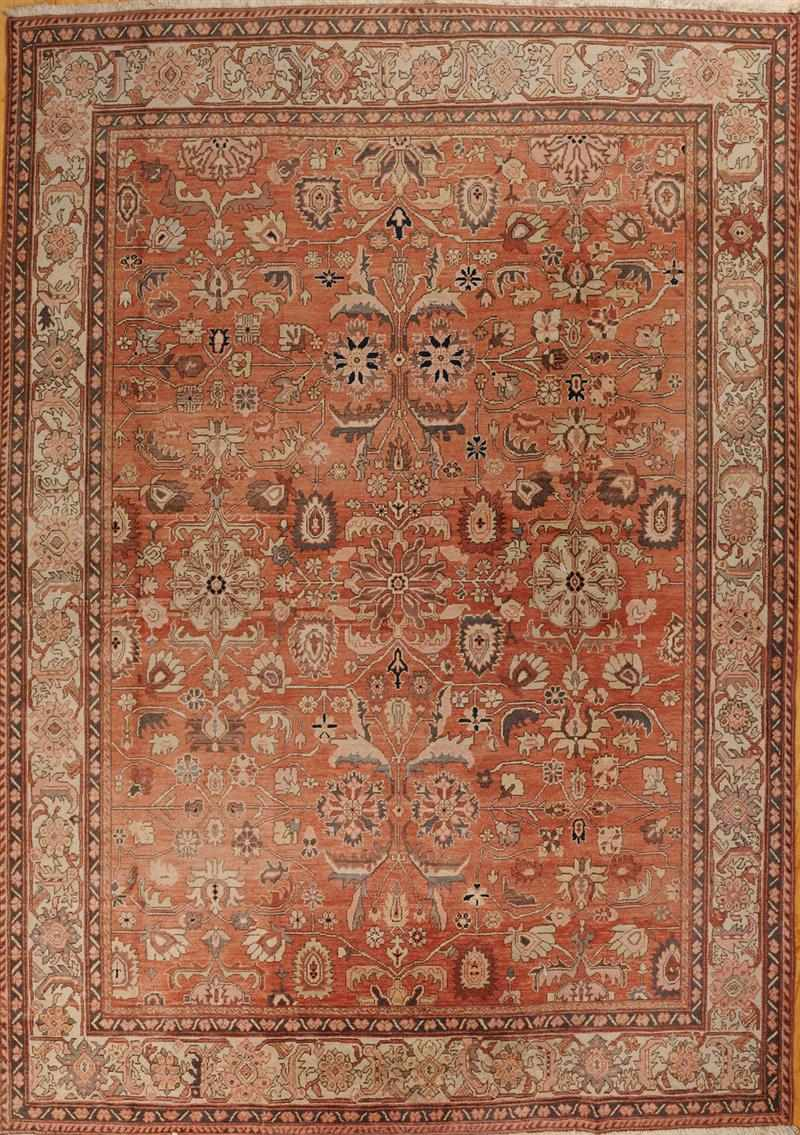 PERSIAN CARPET The terracotta field worked with flowers and vinework