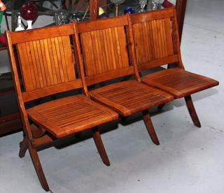 A group of three folding country store chairs A group