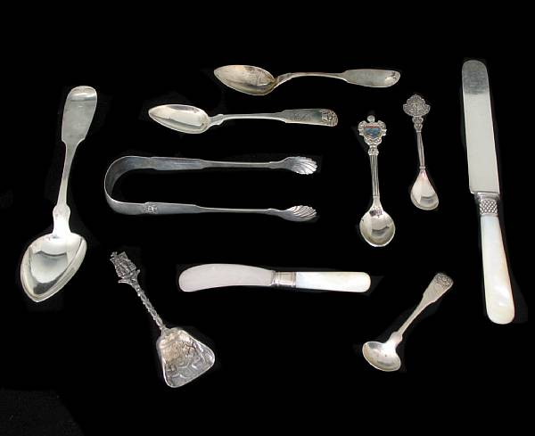 A group of coin and sterling flatware Assembled group of