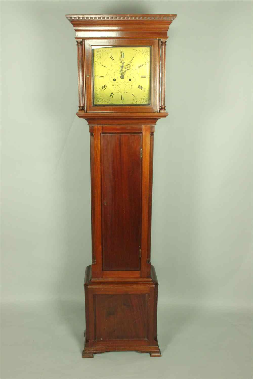 CHIPPENDALE STYLE MAHOGANY TALL CASE CLOCK WITH BRASS FACE having