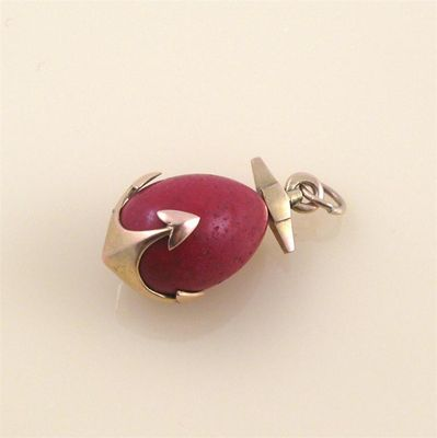 A Russian miniature egg pendant Formed as a gold anchor