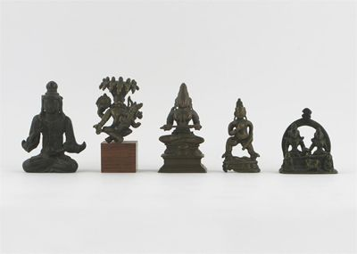 An Indian bronze figure of Narashimha and four further Indian