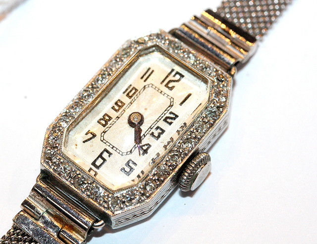 A LADIES ART DECO DIAMOND SET WRIST WATCH with enamelled