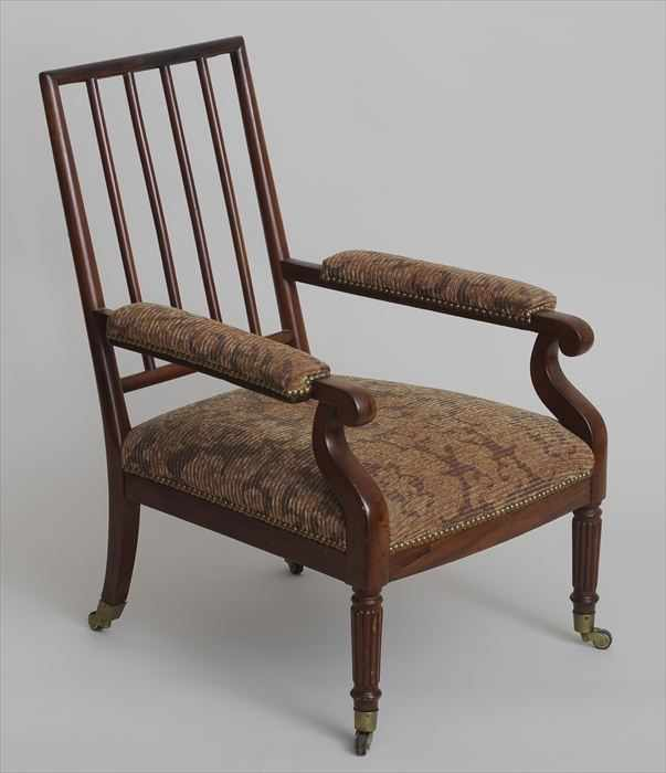 VICTORIAN MAHOGANY LIBRARY CHAIR With a rectangular backrest with four