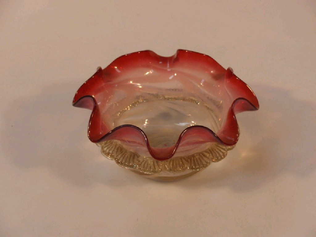 A Victorian cranberry opalescent and lemon glass bowl with wavy