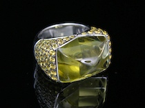 A Contemporary Design 18k Lemon Quartz Yellow Sapphire Ring designed