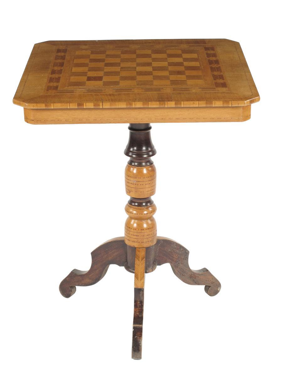 A 19th century continental walnut and parquetry games table
