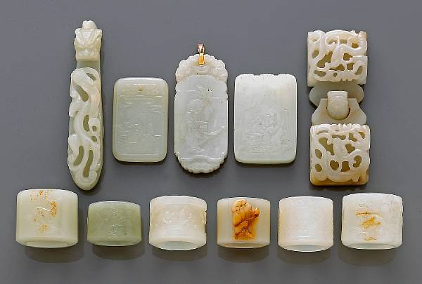 A group of eleven white jade decorations 19th Century and