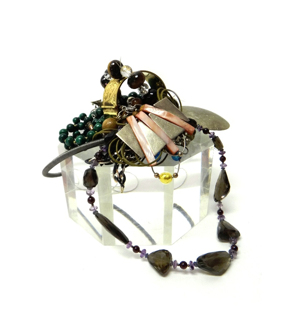 A silver and mother of pearl pendant brooch designed as