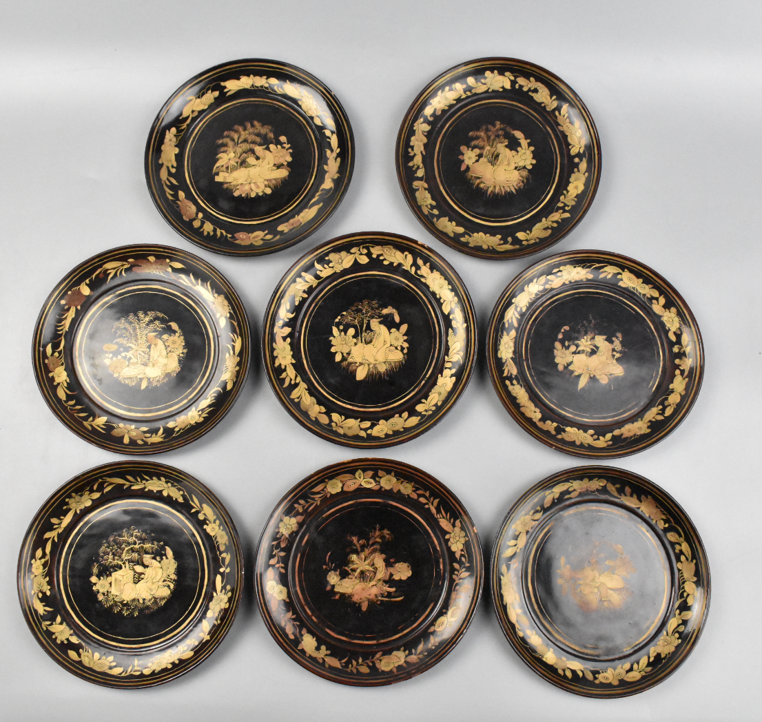 A set of eight Chinese gilt lacquered plates dating from