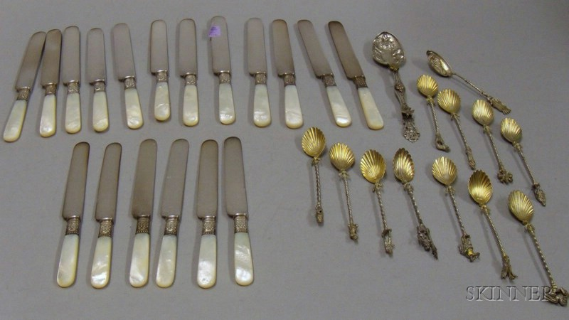 Mother of pearl Handled Knives and Spoons a set of