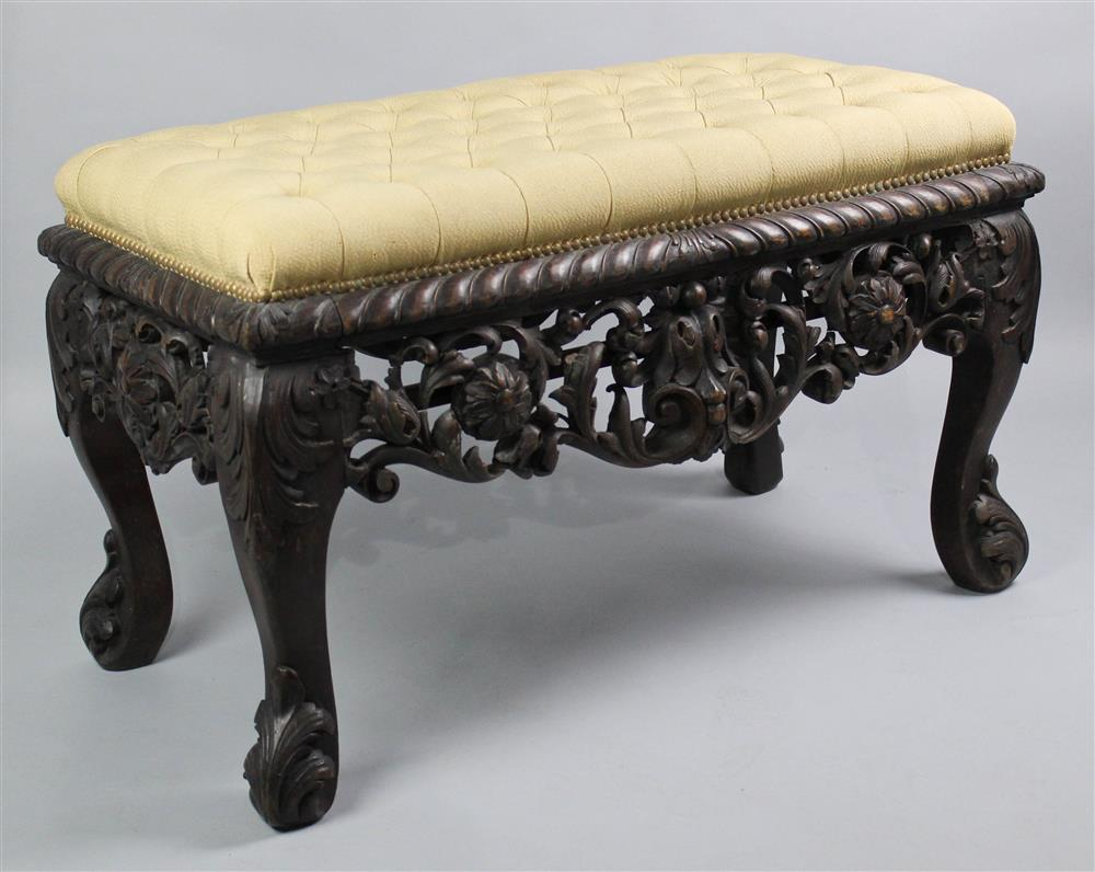 BAROQUE STYLE CARVED WALNUT BENCH with tufted upholstered seat over