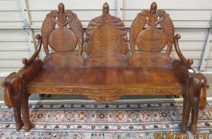 CARVED MAHOGANY ELEPHANT SETTEE India having a triple chair back