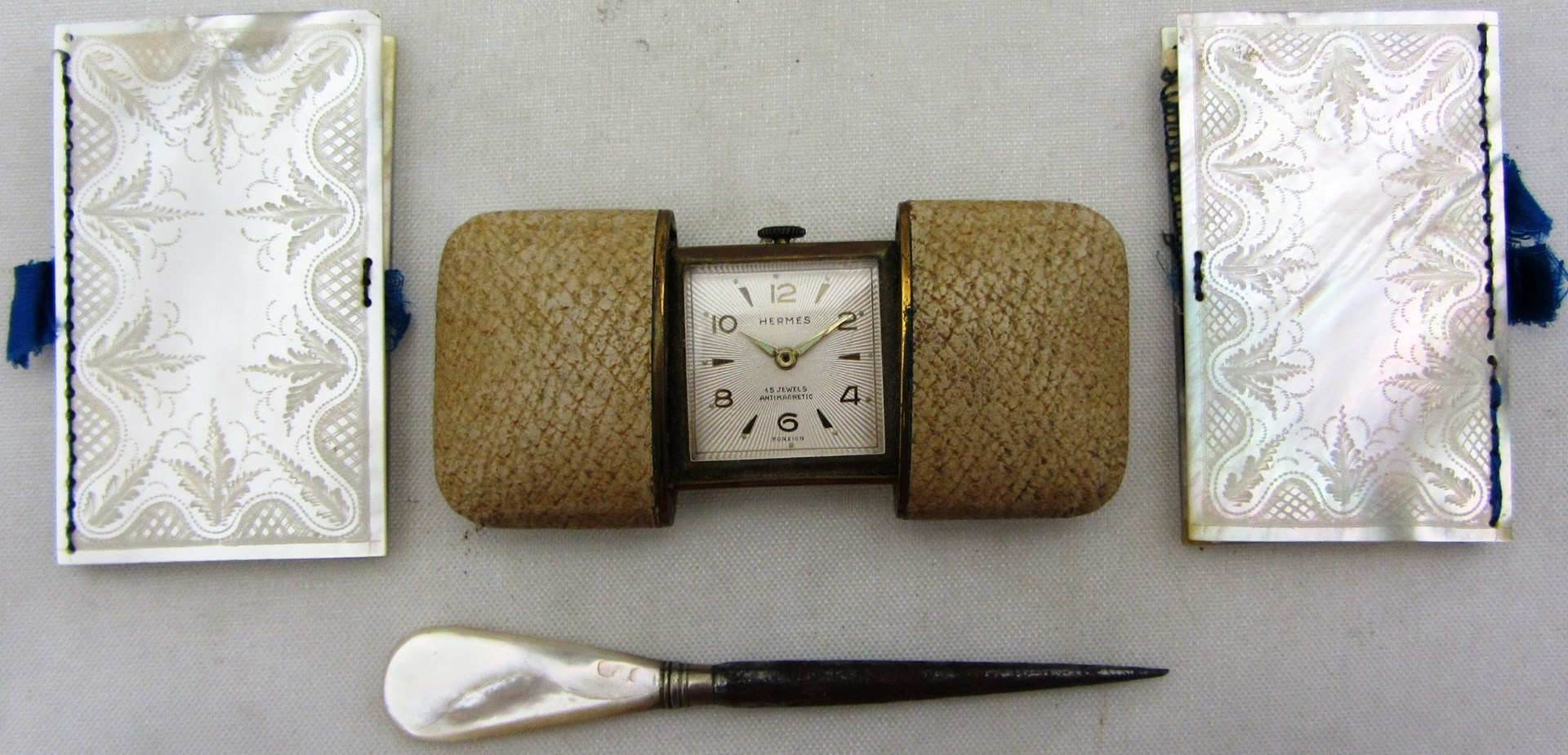 A Hermes rectangular gilt metal cased folding watch two Victorian