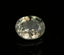 An Unusual Topaz Colored Sapphire An unset oval cut sapphire